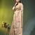 Beige tissue saree with lotus woven design