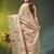 Beige tissue saree with lotus woven design