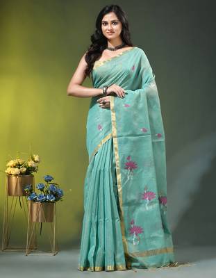 Sky blue tissue saree with lotus woven design 1