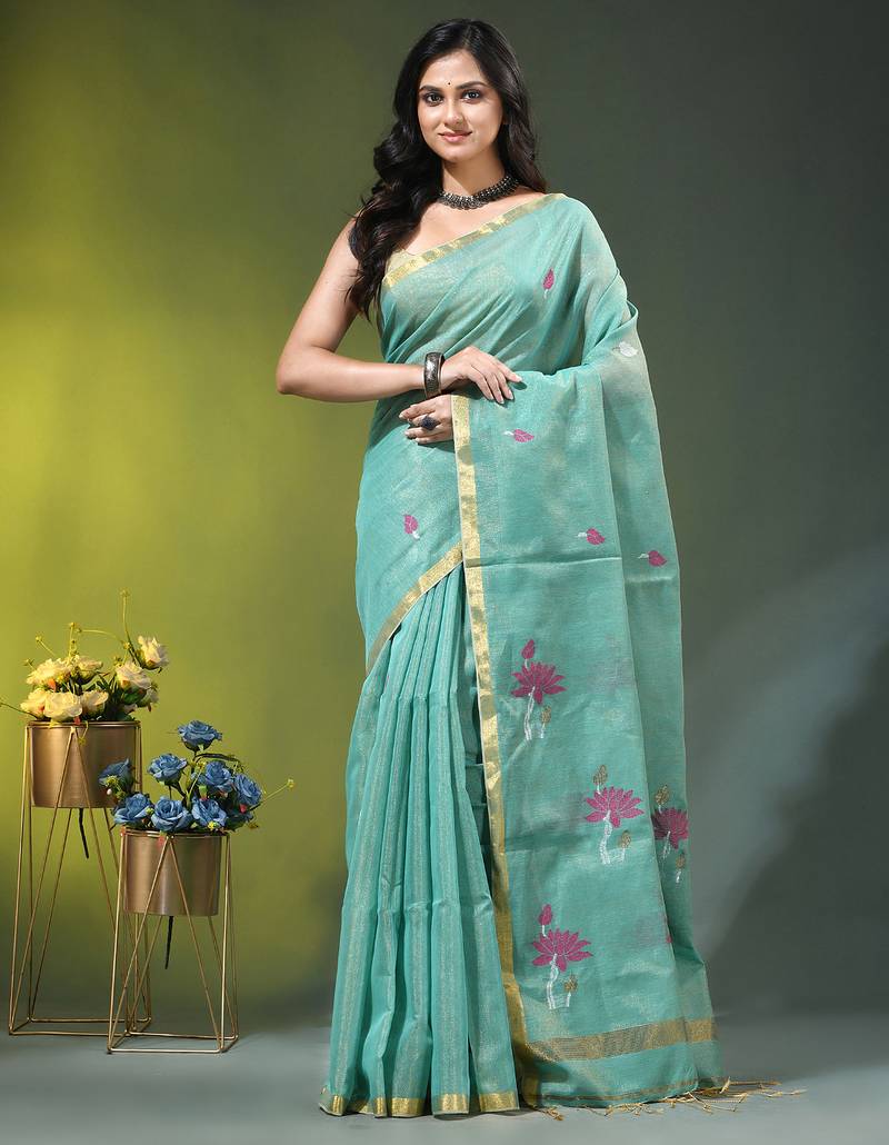 Sky blue tissue saree with lotus woven design