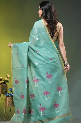 Sky blue tissue saree with lotus woven design