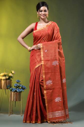Red tissue saree with lotus woven design