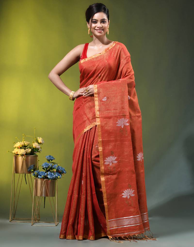 Red tissue saree with lotus woven design