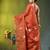 Red tissue saree with lotus woven design