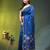 Sapphire blue linen saree with floral woven pallu