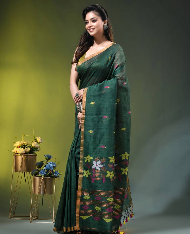 Dark green linen saree with floral woven pallu