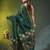 Dark green linen saree with floral woven pallu