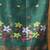 Dark green linen saree with floral woven pallu
