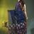 Midnight blue linen saree with floral woven pallu
