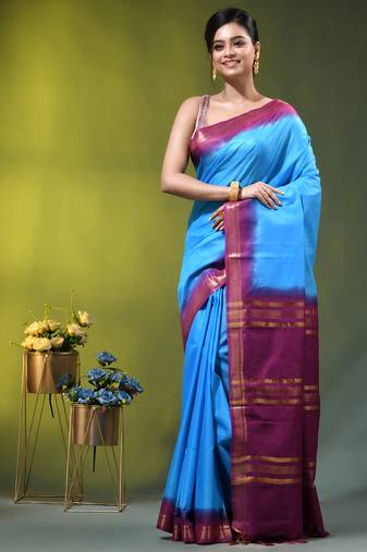 sky blue & purple silk blend saree with zari border