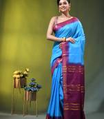 sky blue & purple silk blend saree with zari border