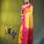 yellow & pink silk blend saree with zari border