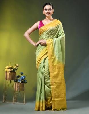 pistachio green & yellow silk blend saree with zari border 1