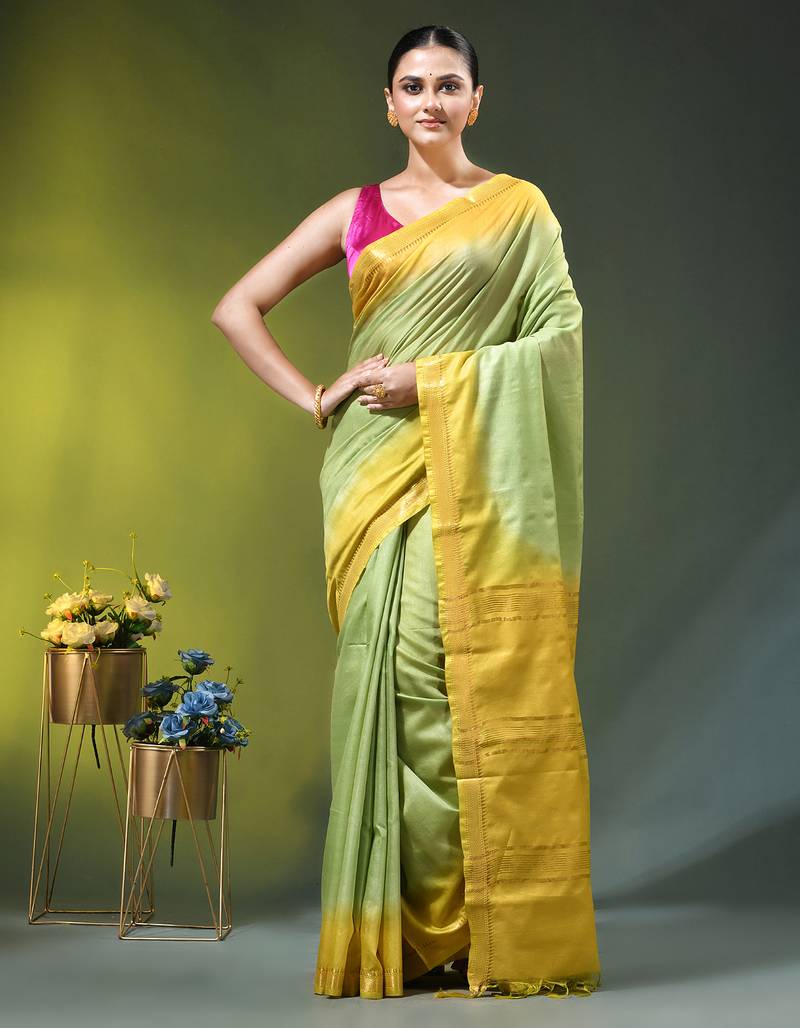 pistachio green & yellow silk blend saree with zari border