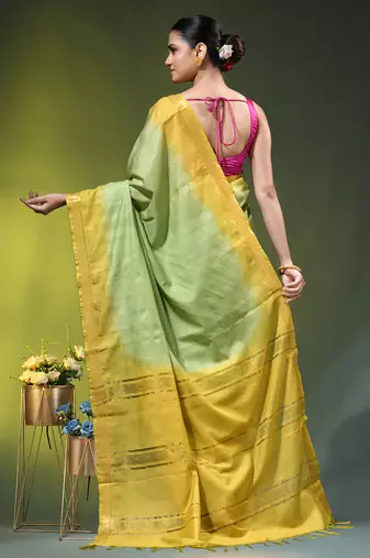 pistachio green & yellow silk blend saree with zari border