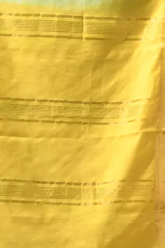 pistachio green & yellow silk blend saree with zari border