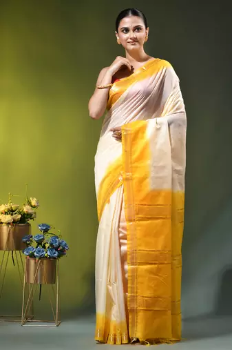 off white & yellow silk blend saree with zari border