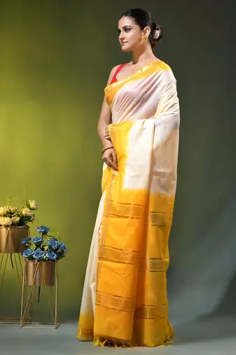 off white & yellow silk blend saree with zari border