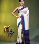 off white & blue silk blend saree with zari border