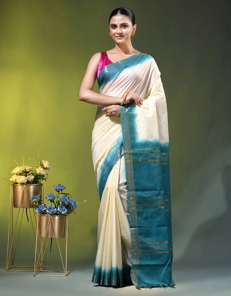 cream & teal blue silk blend saree with zari border