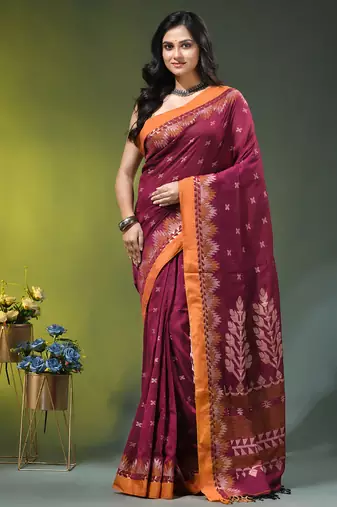 magenta cotton blend saree with ethnic motifs