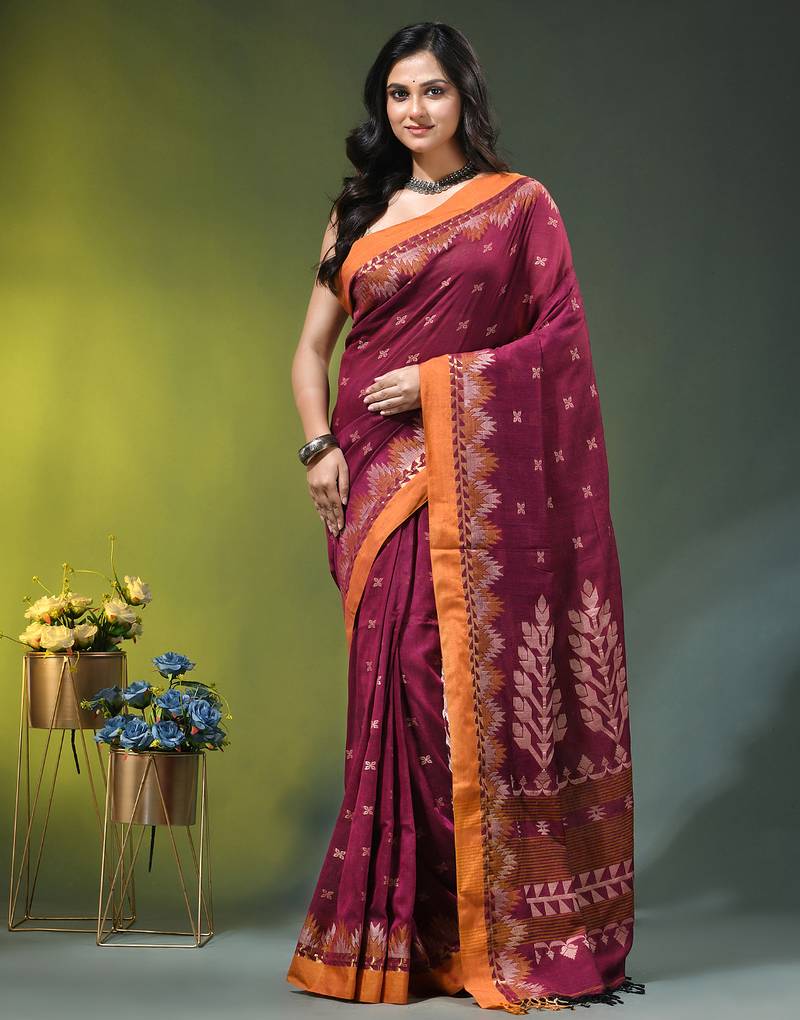 magenta cotton blend saree with ethnic motifs