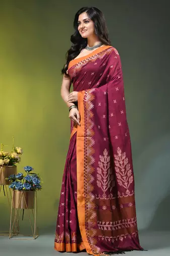 magenta cotton blend saree with ethnic motifs