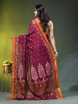 magenta cotton blend saree with ethnic motifs 3