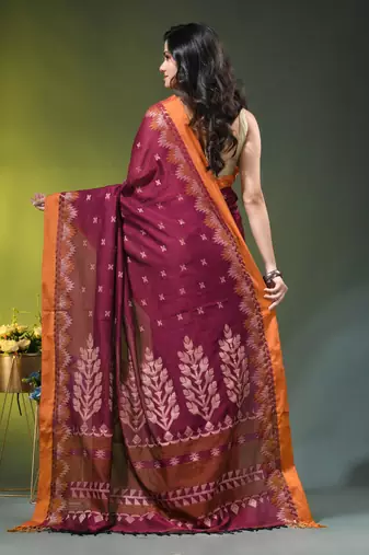 magenta cotton blend saree with ethnic motifs