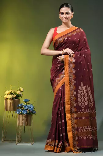 maroon cotton blend saree with ethnic motifs