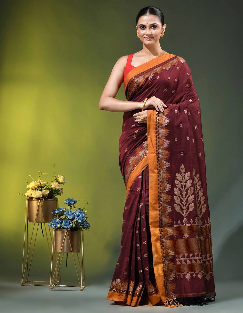maroon cotton blend saree with ethnic motifs