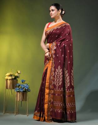 maroon cotton blend saree with ethnic motifs 2
