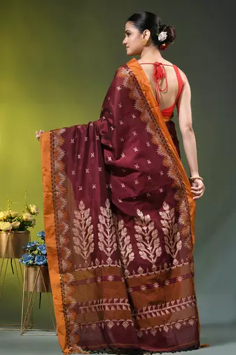 maroon cotton blend saree with ethnic motifs