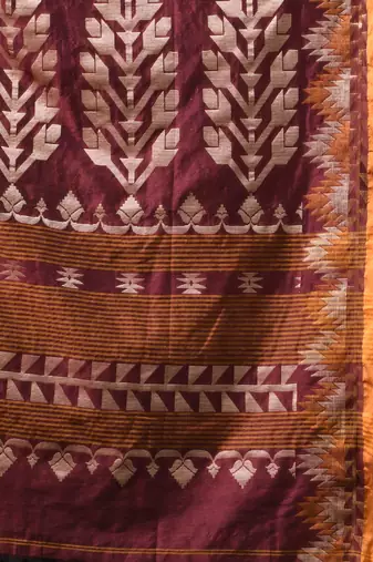 maroon cotton blend saree with ethnic motifs
