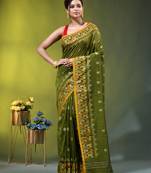 olive green cotton blend saree with ethnic motifs