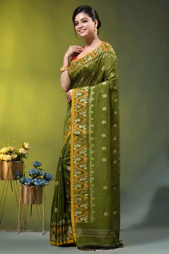 olive green cotton blend saree with ethnic motifs