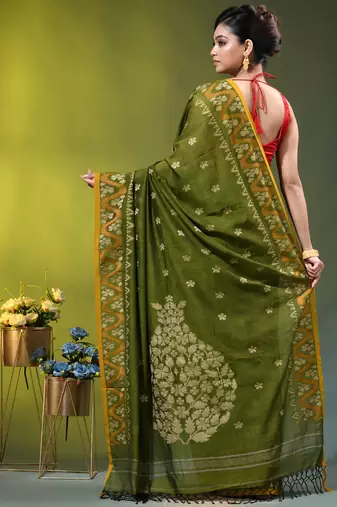 olive green cotton blend saree with ethnic motifs