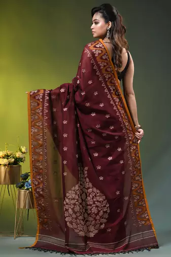 maroon cotton blend saree with ethnic motifs