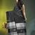 black cotton blend saree with bird motifs