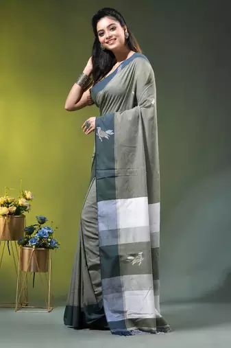 green cotton blend saree with bird motifs