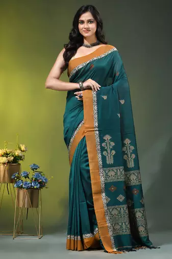 teal cotton blend saree with ethnic motifs