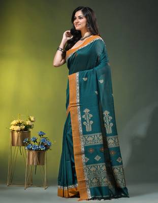 teal cotton blend saree with ethnic motifs 2