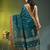 teal cotton blend saree with ethnic motifs