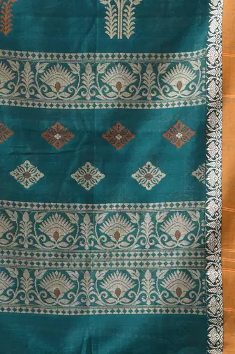 teal cotton blend saree with ethnic motifs