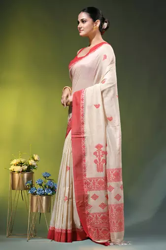 beige cotton blend saree with ethnic motifs