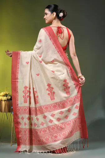 beige cotton blend saree with ethnic motifs