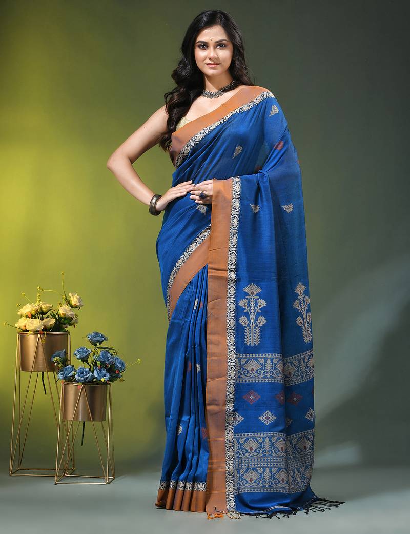 blue cotton blend saree with ethnic motifs