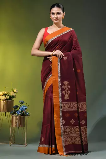 maroon cotton blend saree with ethnic motifs