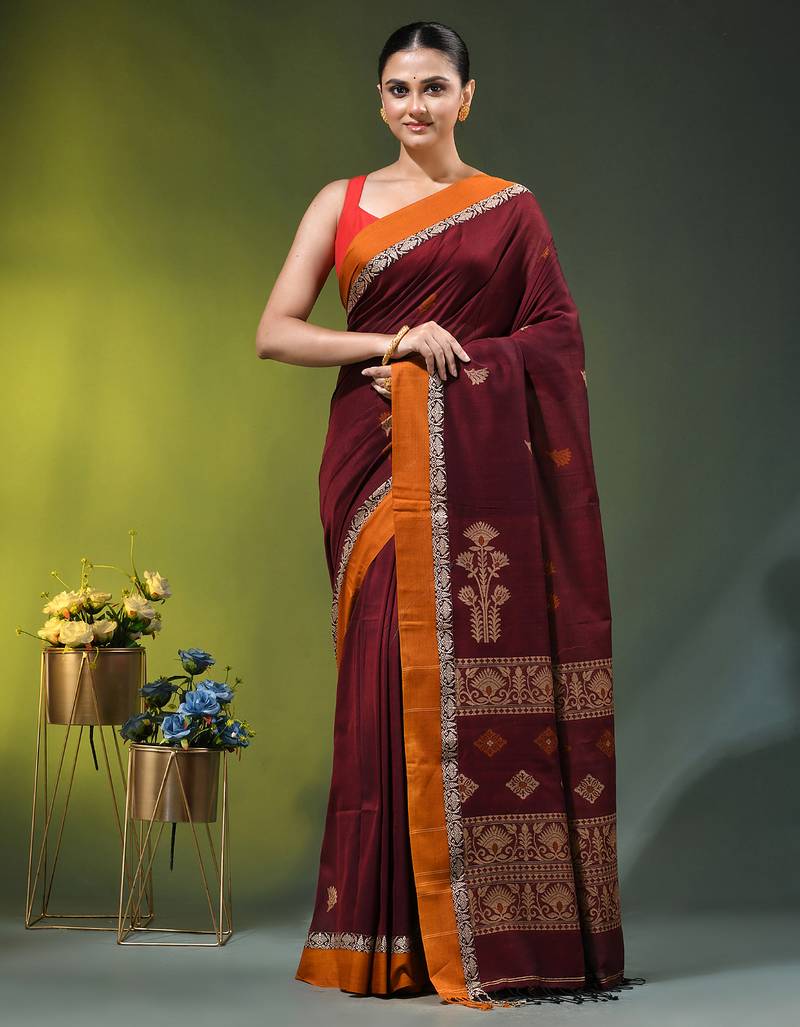 maroon cotton blend saree with ethnic motifs
