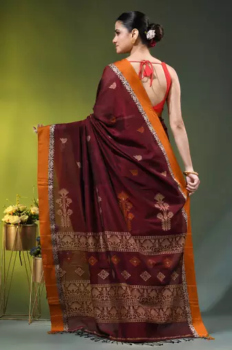 maroon cotton blend saree with ethnic motifs